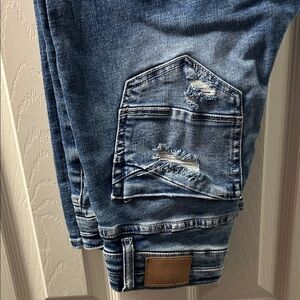 Buckle Women's Blue Distressed Boot Cut Jeans